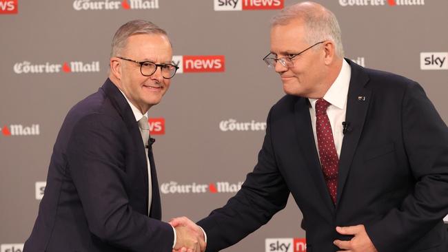 Prime Minister Scott Morrison (right) has been slammed by the United Workers Union for his lack of compassion for aged care workers during the pandemic, while opposition leader Anthony Albanese (left) has pledged a multi-billion dollar package to improve working conditions should Labor win the election on May 21. (Photo by Jason Edwards – Pool/Getty Images)