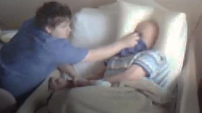 A screengrab from the hidden video, showing Lucas’ abuse of Clarence Hausler.