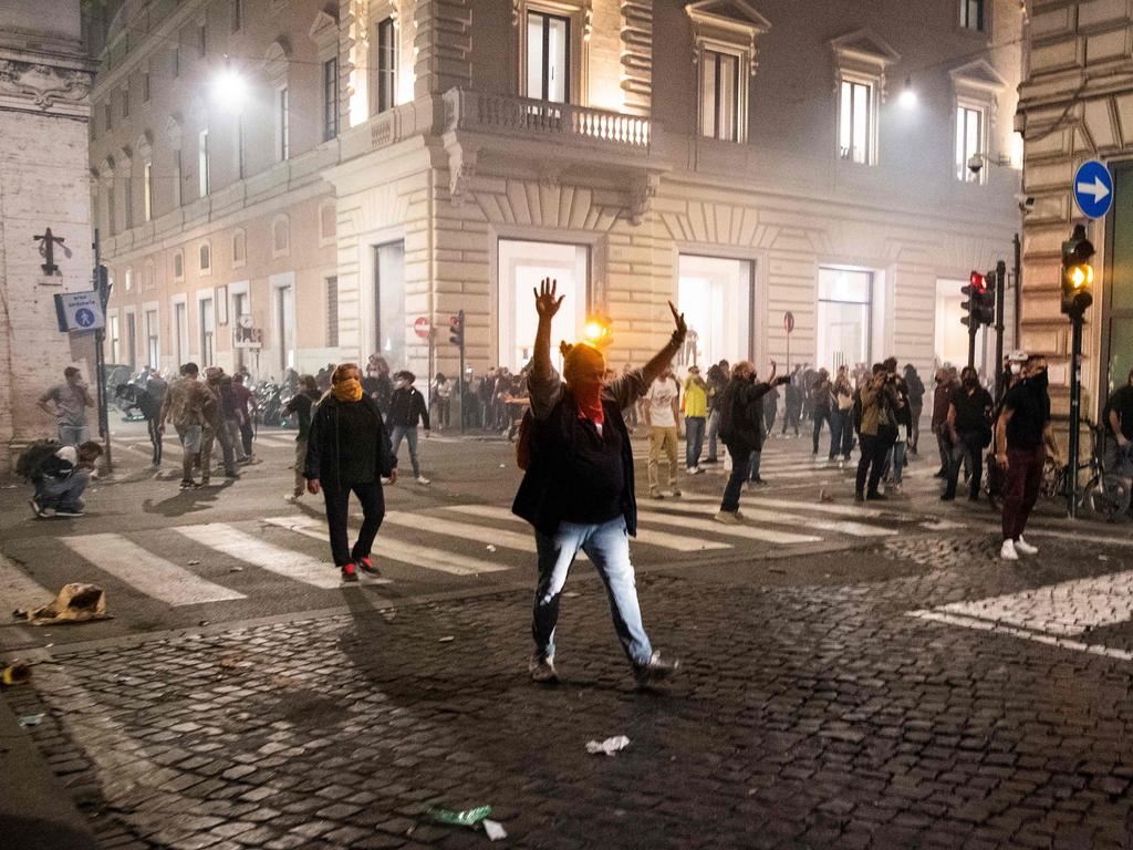 Demonstrators protest against the mandatory sanitary pass or "green pass" in central Rome. Picture: AFP