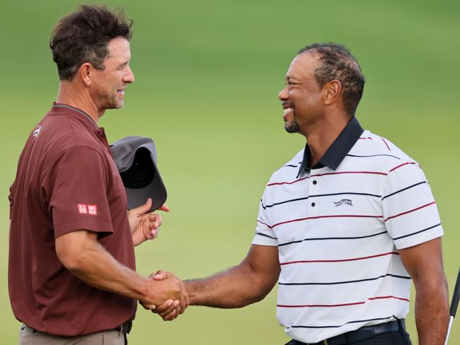 LOUISVILLE, KENTUCKY - MAY 17: Adam Scott of Australia and Tiger Woods of the United States shake hands on the 18th hole during the second round of the 2024 PGA Championship at Valhalla Golf Club on May 17, 2024 in Louisville, Kentucky. (Photo by Andy Lyons/Getty Images)