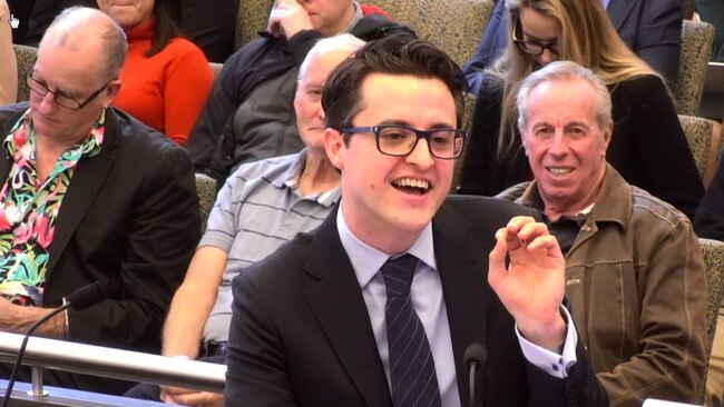 A laugh from Michael Hodge QC after he is interrupted by his Apple Watch.