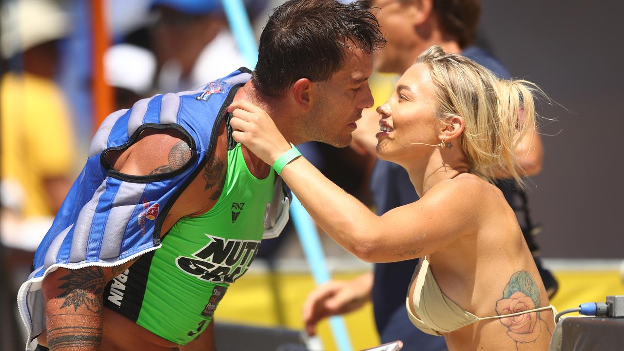 Matt Poole and girlfriend Tammy Hembrow are seen together during the Nutri-Grain Ironman series in February. Photo by Chris Hyde/Getty Images.