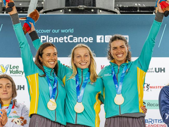 Noemie Fox (left) and Jessica Fox (right) along with Kate Eckhardt after winning the three person kayak teams event at the 2023 Canoe Slalom World Championships. Picture: Kim Jones Photography