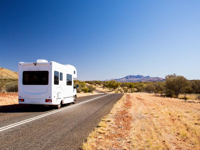 A campervan is seen travelling on 1 Namatjira Drive near Mt Zeil in the Northern Territory. Picture: File