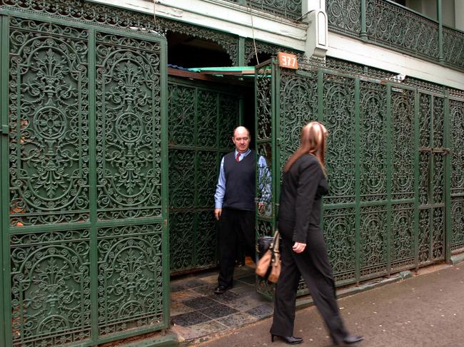 The iconic privacy screens on the front of the Surry Hills bordello.