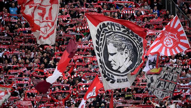 Cologne supporters at the German Bundesliga match against Bayern Munich in February. Cologne have returned three positive tests for coronavirus as the league gears up for a resumption this month. Picture: AFP