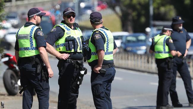 Tasmania Police in attendance at the scene in New Town where initial inquiries indicate a motorcyclist participating in the MRA South Toy Run has left the roadway and collided with a group of spectators. Picture: Nikki Davis-Jones