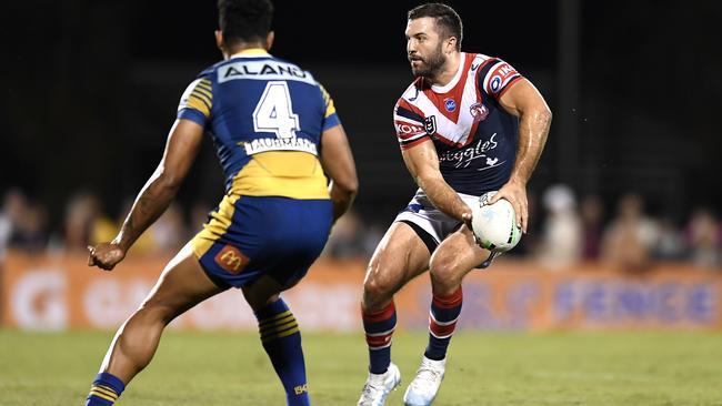 James Tedesco of the Roosters looks to pass the ball during the round 20 NRL match between the Sydney Roosters and the Parramatta Eels at BB Print Stadium, on July 29, 2021, in Mackay, Australia. Picture: Albert Perez – Getty Images