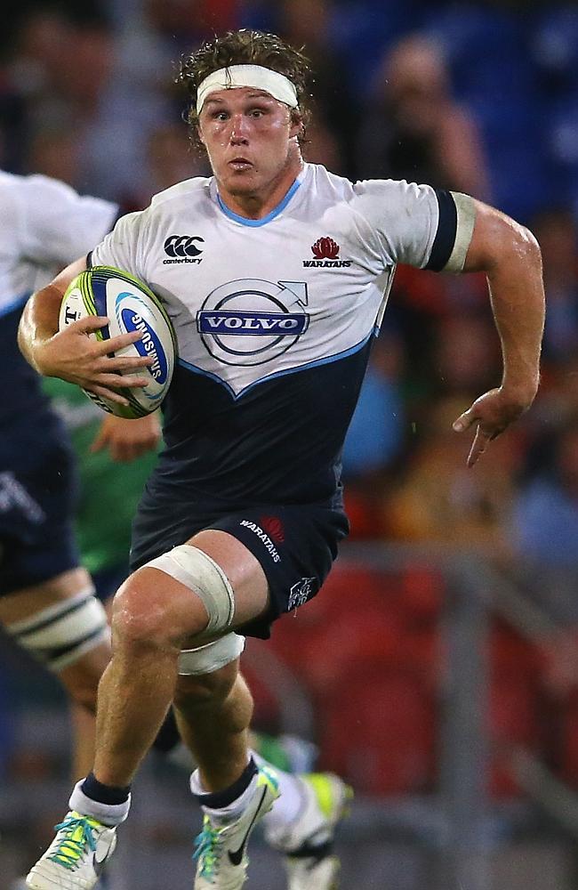 Michael Hooper of the Waratahs makes a break.