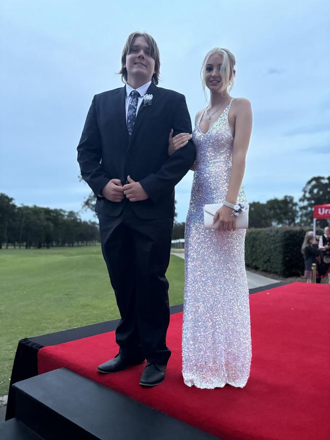 The students of Urangan State High School arriving at their formal.