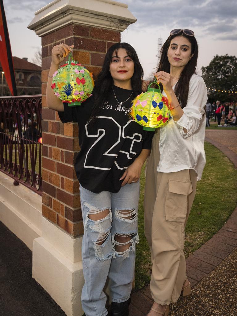 Raghda Alkhago (left) and Majida Bishar at Multicultural Australias Luminous Lantern Parade in the grounds of Empire Theatres, Saturday, August 12, 2023. Picture: Kevin Farmer