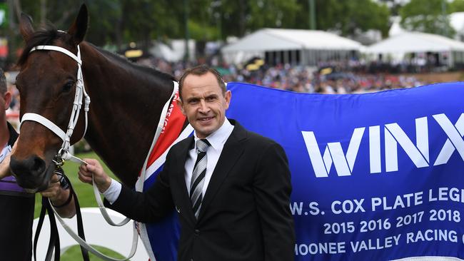 Trainer Chris Waller is seen with Winx 