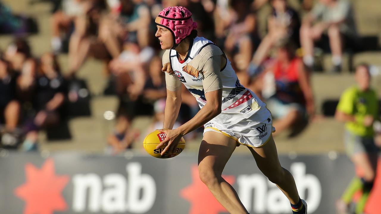 FREMANTLE, WESTERN AUSTRALIA - FEBRUARY 26: Heather Anderson of the Crows looks to pass the ball during the round four AFL Women's match between the Fremantle Dockers and the Adelaide Crows at Fremantle Oval on February 26, 2017 in Fremantle, Australia. (Photo by Will Russell/AFL Media/Getty Images)