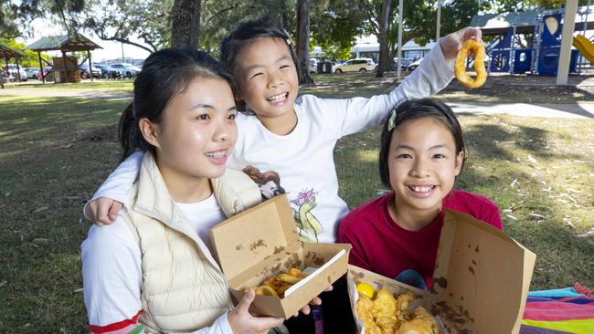 Selina, Natasha and Jacinta Chen enjoyed their seafood picnic at the park opposite Morgans Seafood on May 9. Picture: Renae Droop