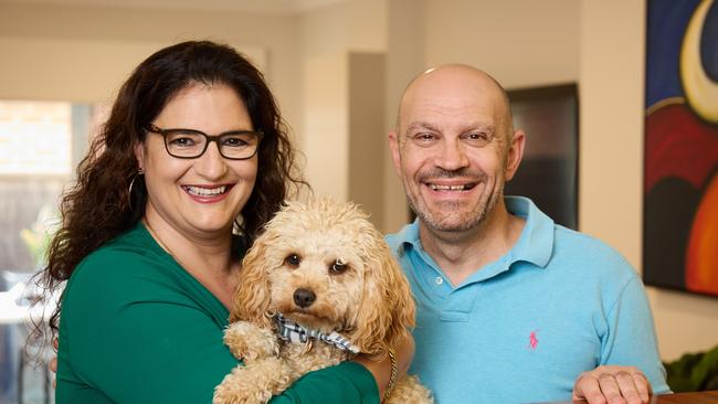 Sophie and Alex Savvas, pictured with their dog, Benji, have invested over many years while working. Picture: Matt Loxton