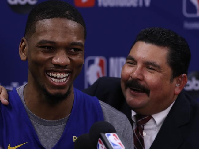 TORONTO, ON- MAY 29 - Golden State Warriors forward Alfonzo McKinnie (28) is interviewed by Jimmy Kimmel security guard Guillermo Rodriguez as the Toronto Raptors and Golden State Warriors host open practice and media day on the eve of the NBA Finals in Toronto. May 29, 2019. (Steve Russell/Toronto Star via Getty Images)