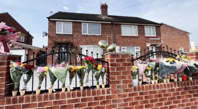 Flowers have been left outside the mum's home. Picture: Ben Lack