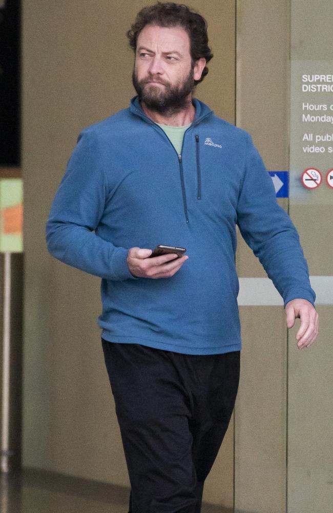 Jason Michael Bowman leaves Brisbane Supreme Court after his wife Sandra Houston was sentenced for manslaughter, Wednesday, July 6, 2022. Picture: Richard Walker