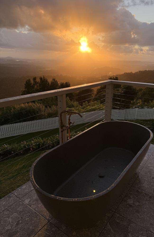The bath on the deck has a stunning view to take in. Photo: Mark Furler