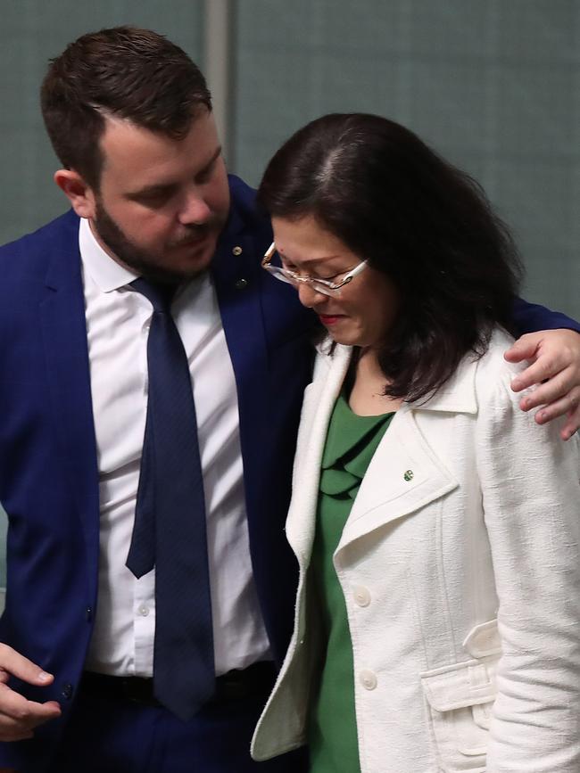 Phillip Thompson hugs Gladys Liu in the House of Representatives Chamber. Picture: Kym Smith