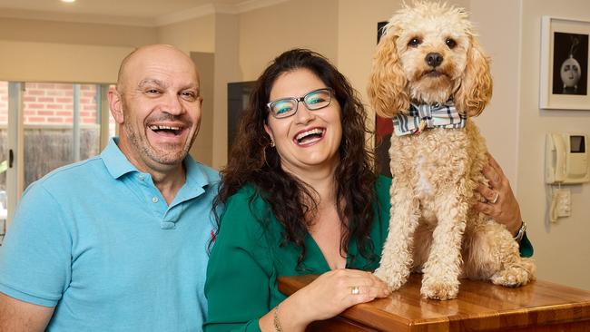 Alex and Sophie Savvas with their dog, Benji, 10 months, at home in Plympton, where theyÃve invested over many years while working, Tuesday, March 7, 2023. Picture: Matt Loxton