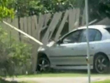 The moment the silver Holden Commodore ploughs through the fence. Picture: Supplied.