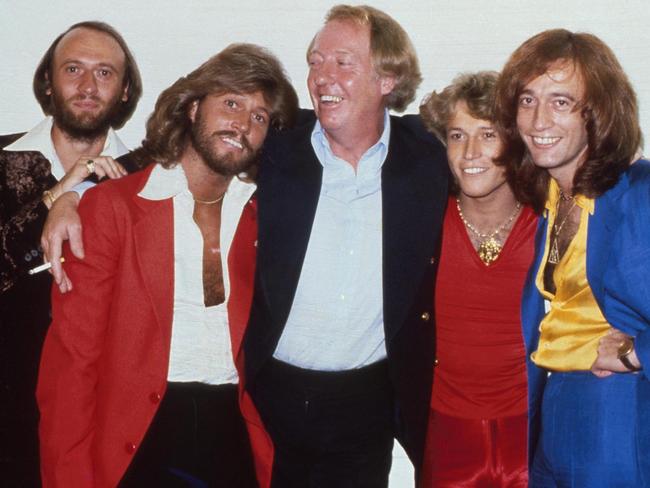 The Bee Gees with brother Andy Gibb and manager Robert Stigwood in New York in 1979. Picture: Michael Putland/Getty Images