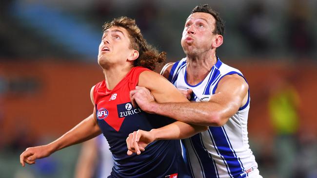 Melbourne’s Luke Jackson in action against North Melbourne ruckman Todd Goldstein. Picture: Mark Brake/Getty Images