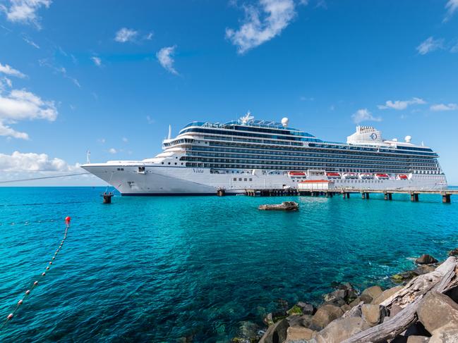 Cruise ship Oceania Cruises Vista in the port of Roseau, Dominica.