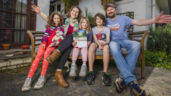 Chris Lane, 42, and his wife Jacinta, 44, together with their children recently purchased their first home. Picture: Nicole Cleary