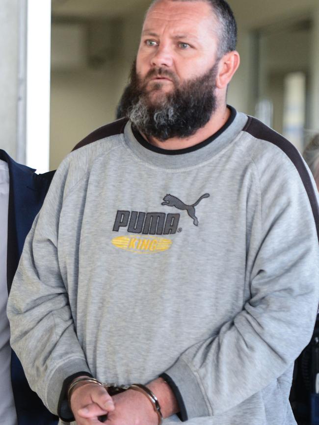 Steven Hainsworth arrives in Adelaide after being extradited from Melbourne. Picture: Brenton Edwards