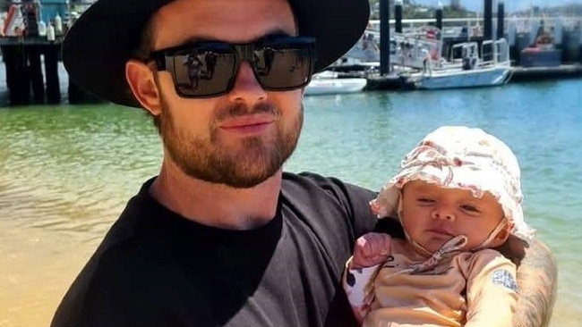 Mark Peebles pictured with young daughter