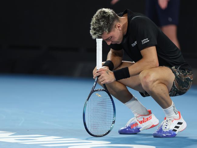 MELBOURNE, AUSTRALIA - JANUARY 19:  Thanasi Kokkinakis of Australia shows his dejection during his five set defeat in their round two singles match against Andy Murray of Great Britain during day four of the 2023 Australian Open at Melbourne Park on January 19, 2023 in Melbourne, Australia. (Photo by Clive Brunskill/Getty Images)