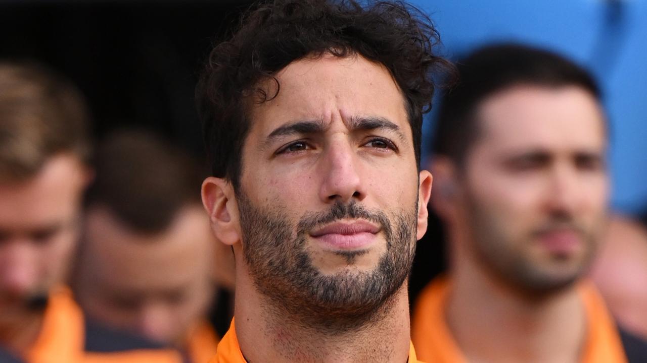 MONZA, ITALY - SEPTEMBER 09: Daniel Ricciardo of Australia and McLaren is pictured as Formula 1 holds a minutes silence in mourning of Queen Elizabeth II prior to practice ahead of the F1 Grand Prix of Italy at Autodromo Nazionale Monza on September 09, 2022 in Monza, Italy. (Photo by Clive Mason/Getty Images)