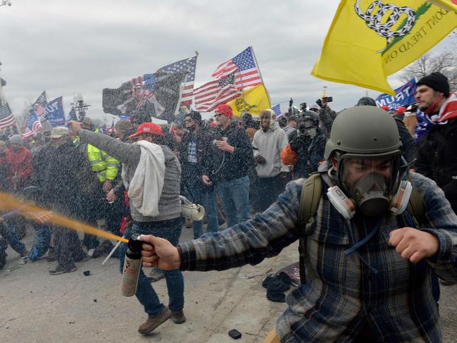 Trump supporters clash with police and security forces as people try to storm the US Capitol Building in Washington, DC. Picture: AFP