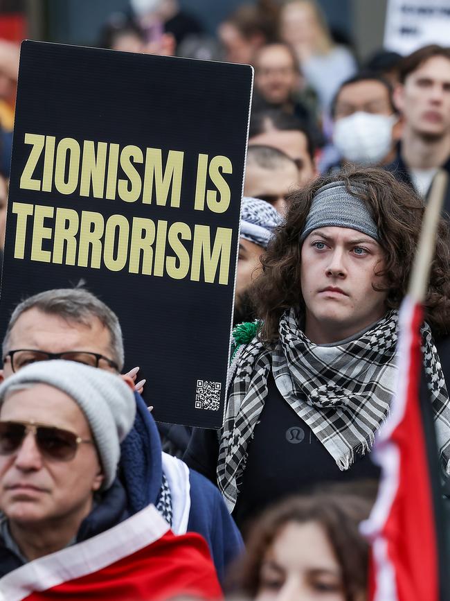 A placard at a Melbourne rally. Picture: Ian Currie