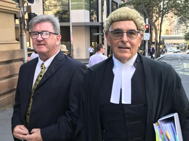 Barrister Clive Steirn SC arrives at the NSW Supreme Court with veteran TV journalist Steve Barrett. Picture: Natalie O'Brien