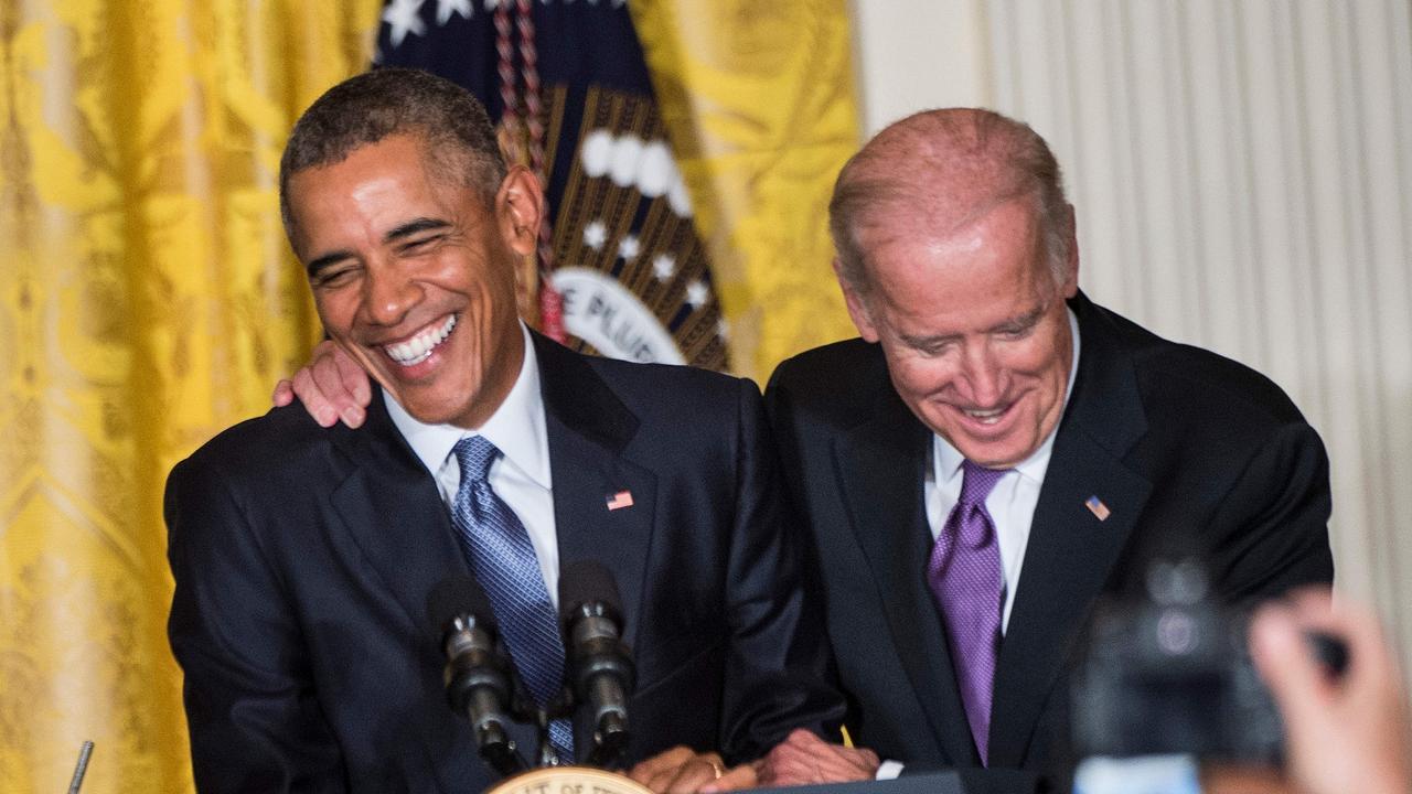 Close friends Joe Biden and Barack Obama pictured in 2015. Picture: Brendan Smialowski/AFP 