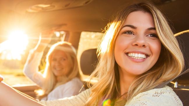 Daughter and mother going on a family vacation.  istock image