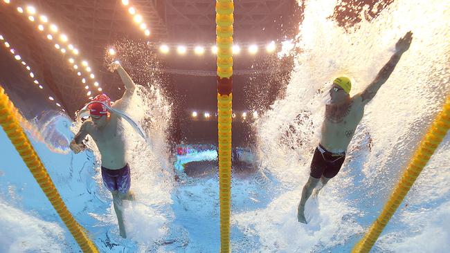 Chalmers (right) has now completed his gold medal collection. Picture: Getty Images.