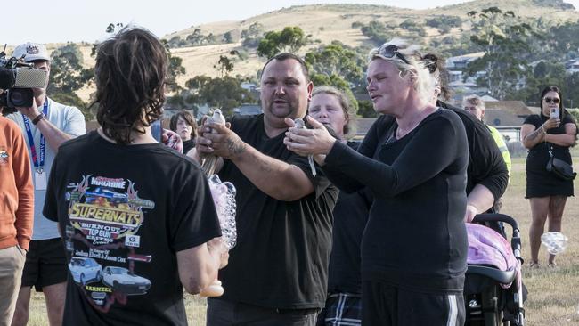 Parents of Jordan and Harlyn Sage Mazey and Jess Steel releasing two doves. Picture: Caroline Tan