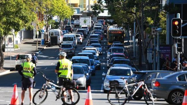 Police at the intersection of Wharf Street and Wickham Terrace in Brisbane after the crash. Picture: AAP/Claudia Baxter