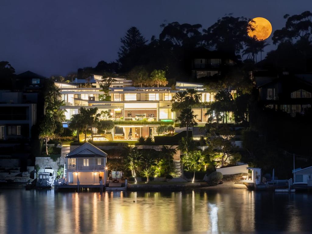 Named "Nautilus", the home is perched on four premium foreshore blocks and the internal space spans six levels.