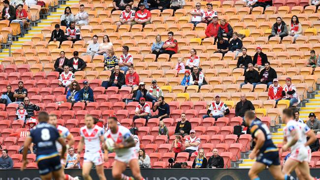 Spectators look on during yesterday’s match between the Gold Coast Titans and St George at Suncorp Stadium. Picture: Dan Peled/AAP