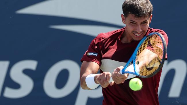 NEW YORK, NEW YORK - AUGUST 26:  Alexei Popyrin of Australia returns against Soonwoo Kwon of Korea during their Men's Singles First Round match on Day One of the 2024 US Open at the USTA Billie Jean King National Tennis Center on August 26, 2024 in the Flushing neighborhood of the Queens borough of New York City. (Photo by Sarah Stier/Getty Images)