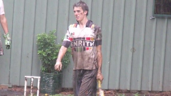 Pat Cummins playing backyard cricket after his game was called off in October 2009