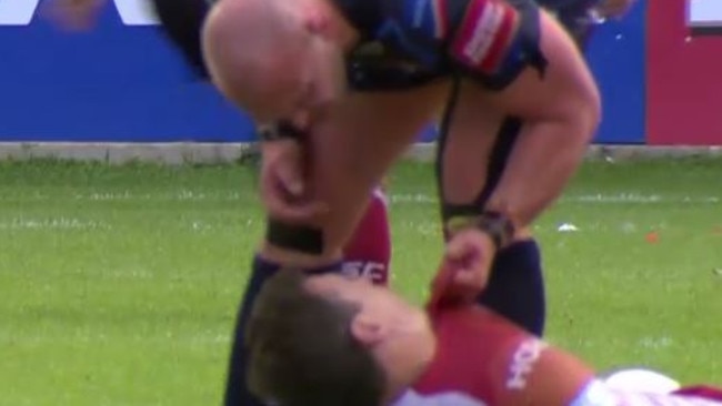 Jamie Acton lifts a prone Greg Bird by the shirt.