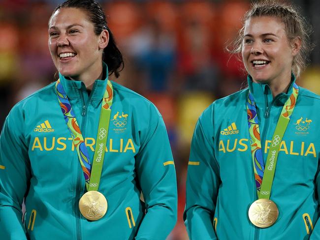 Sharni Williams and Nicole Beck shows off their medals.