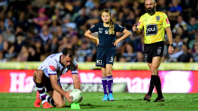 Jada Smith watches on as her dad is about to become tie all time highest point scorer . NRL ; North Queensland Cowboys Vs Melbourne Storm at 1300 Smiles Stadium. Picture: Alix Sweeney