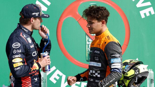 The front row of the grid, Max and Lando. (Photo by SIMON WOHLFAHRT / AFP)